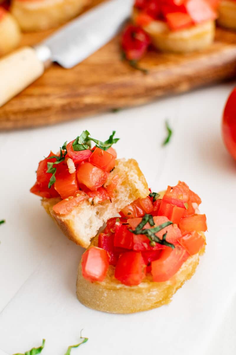 two slices of bruschetta with tomatoes