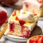 featured strawberry lemonade poke cake