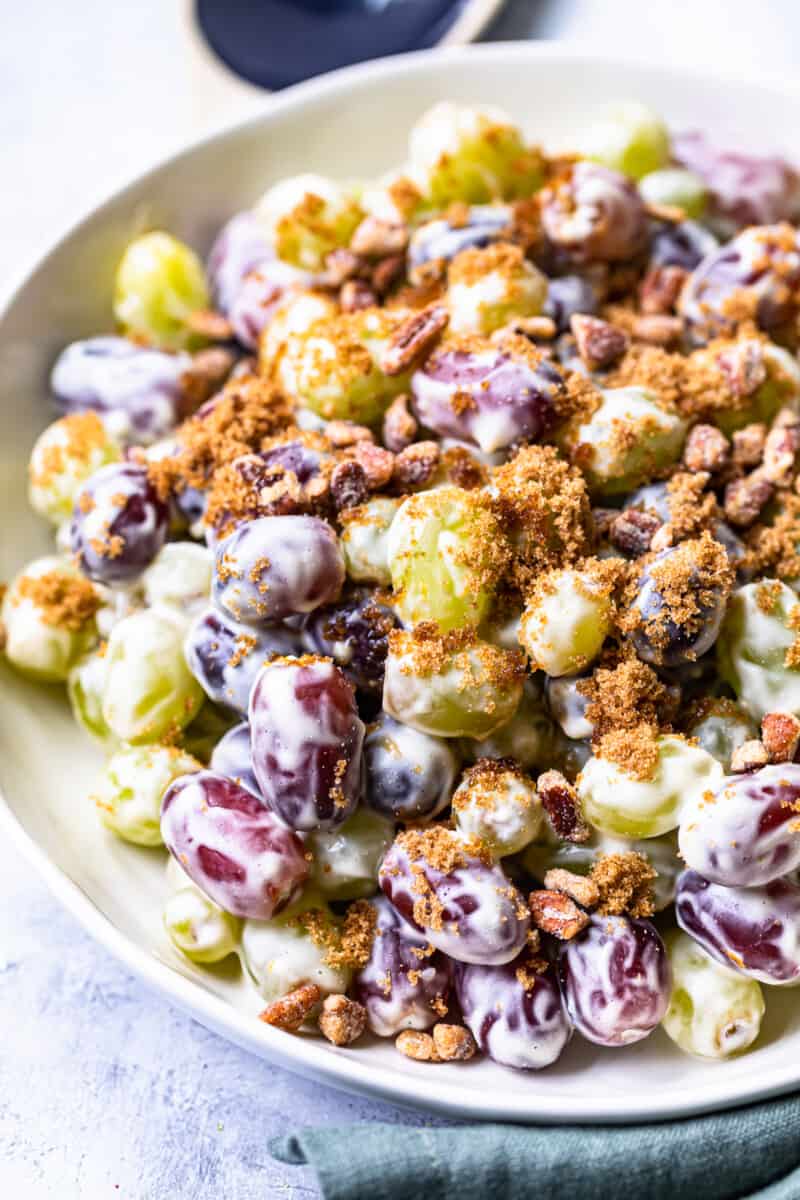 white bowl with crunchy grape salad