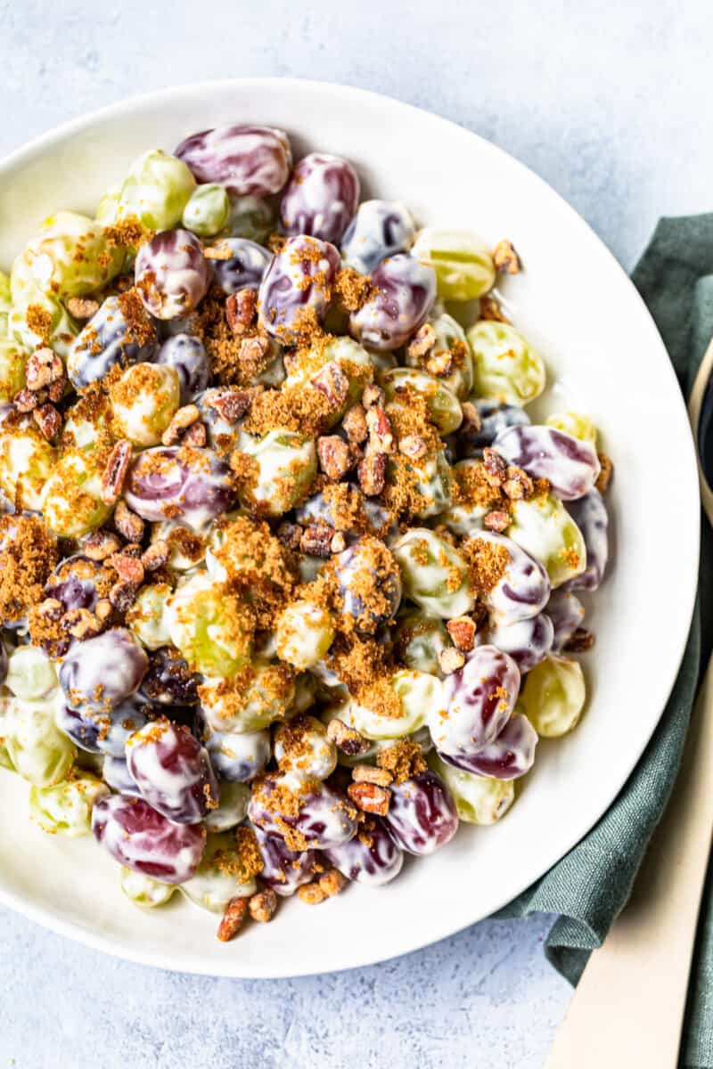 white bowl with crunchy grape salad