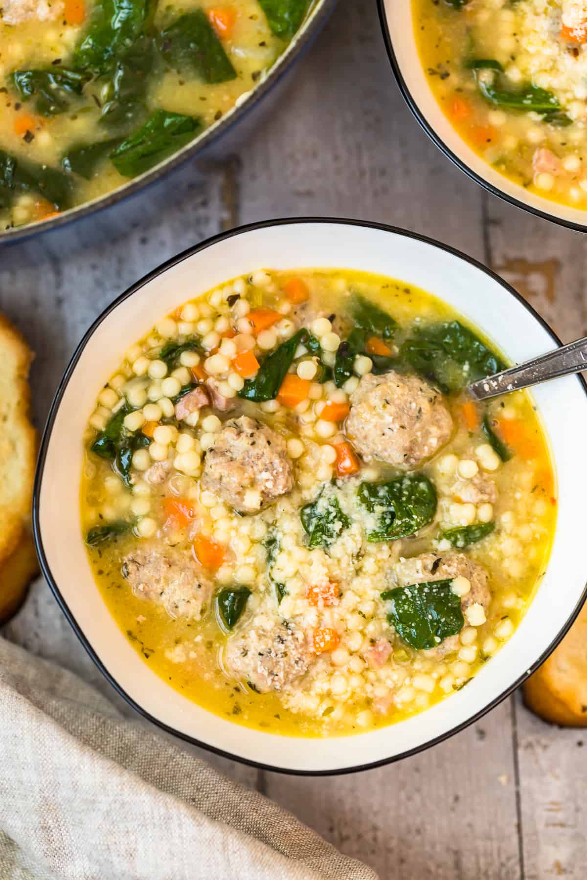 overhead white bowl of Italian wedding soup