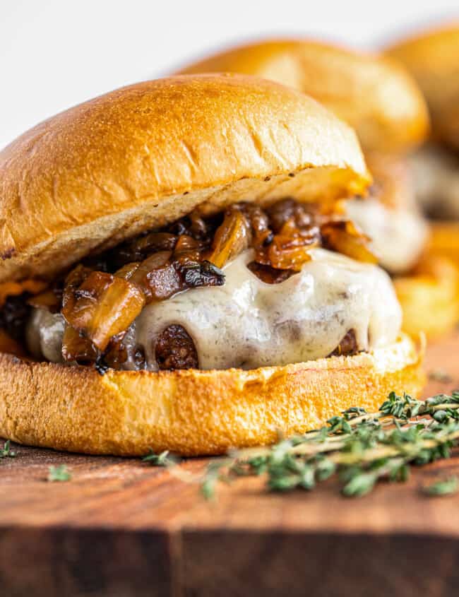 up close image of caramelized onion swiss burger