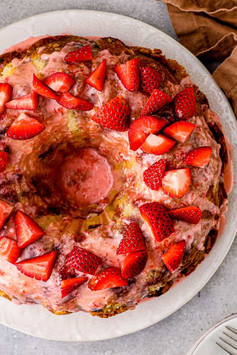 overhead up close strawberry pound cake on white plate