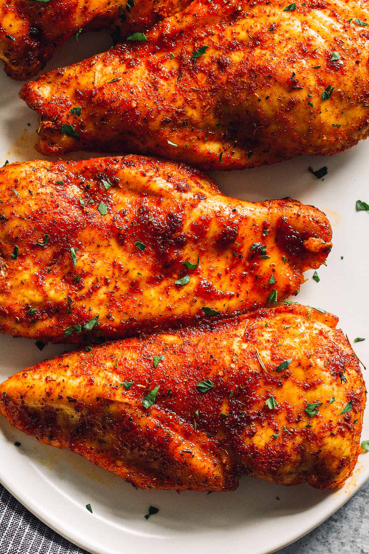 up close juicy baked chicken breasts