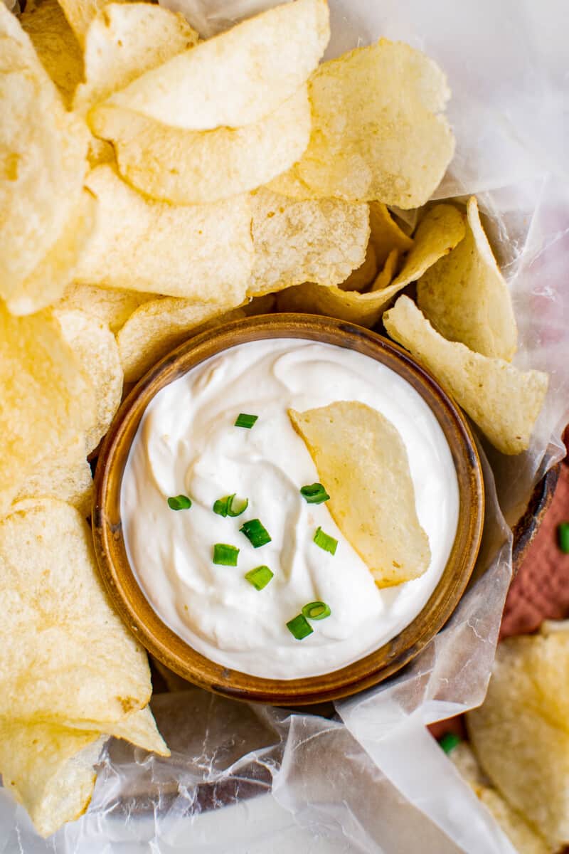 chip dip in a bowl garnished with chives