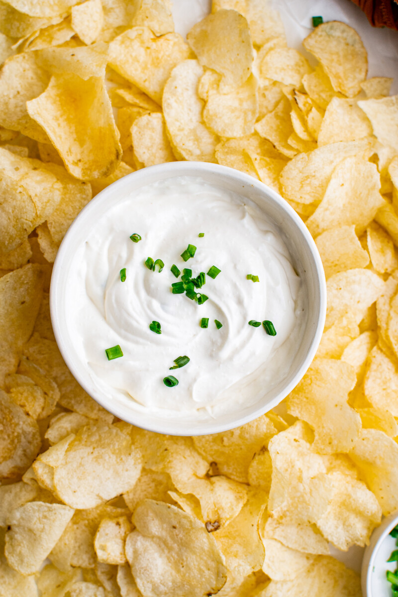 white bowl filled with white dip for chips