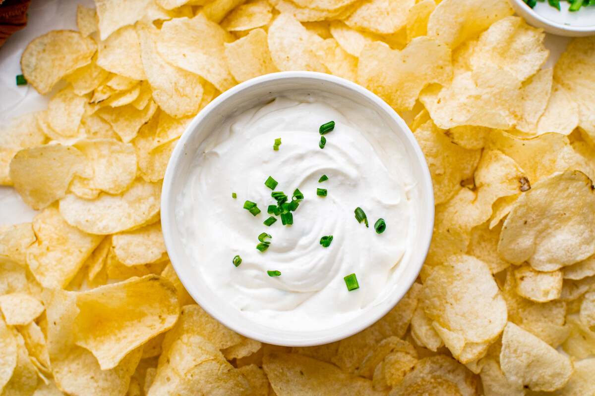 white bowl filled with white dip for chips.