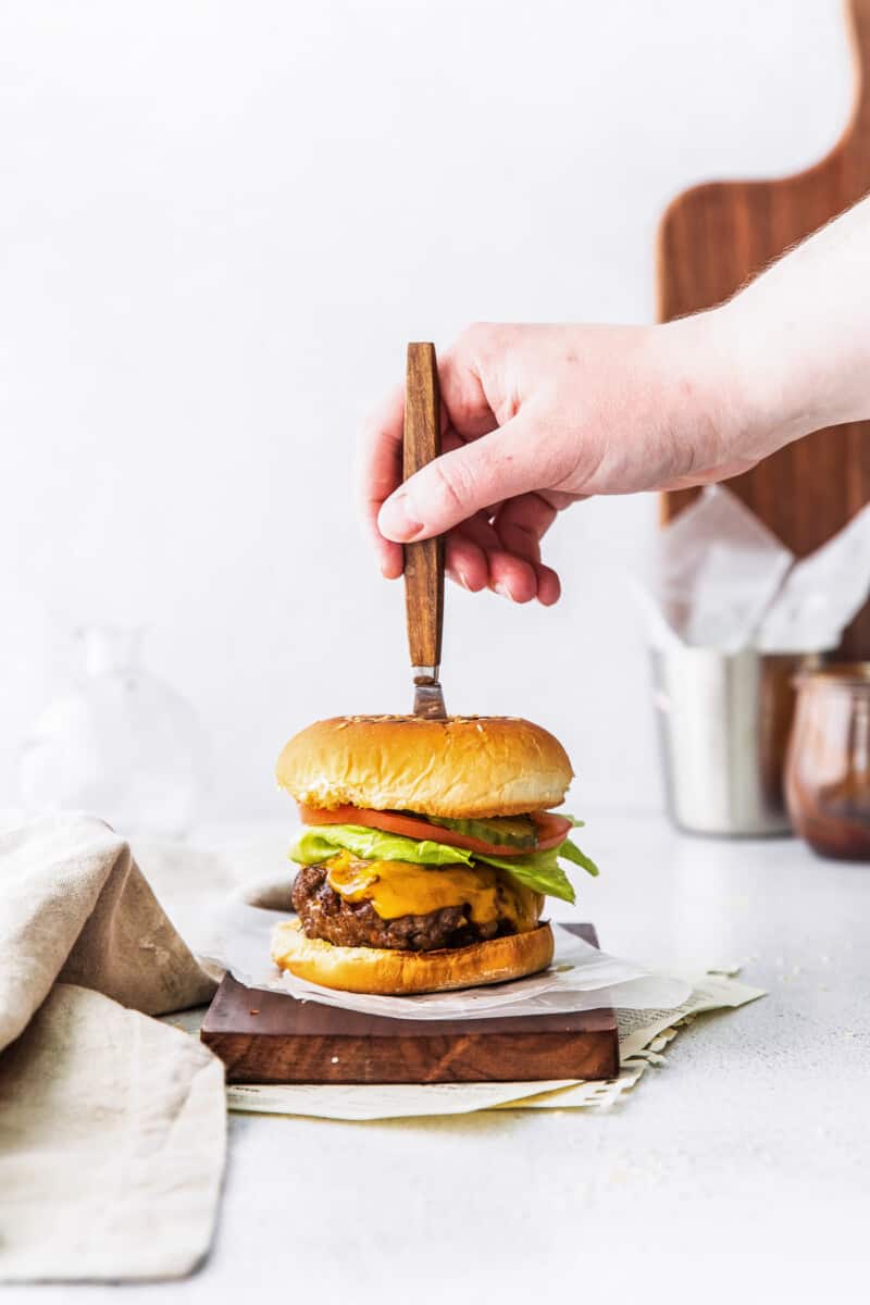 air fryer bbq burger with knife in top