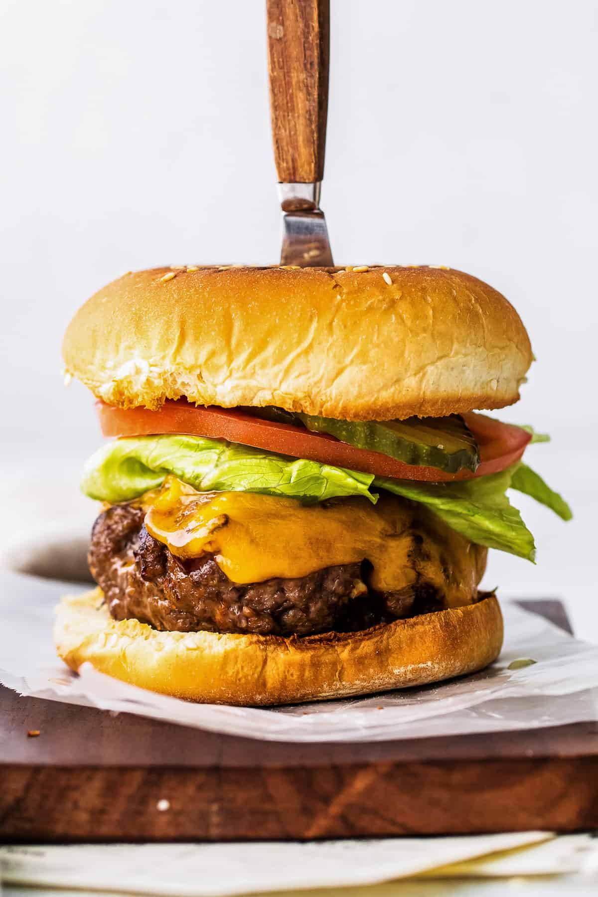 air fryer bbq burger with knife in top