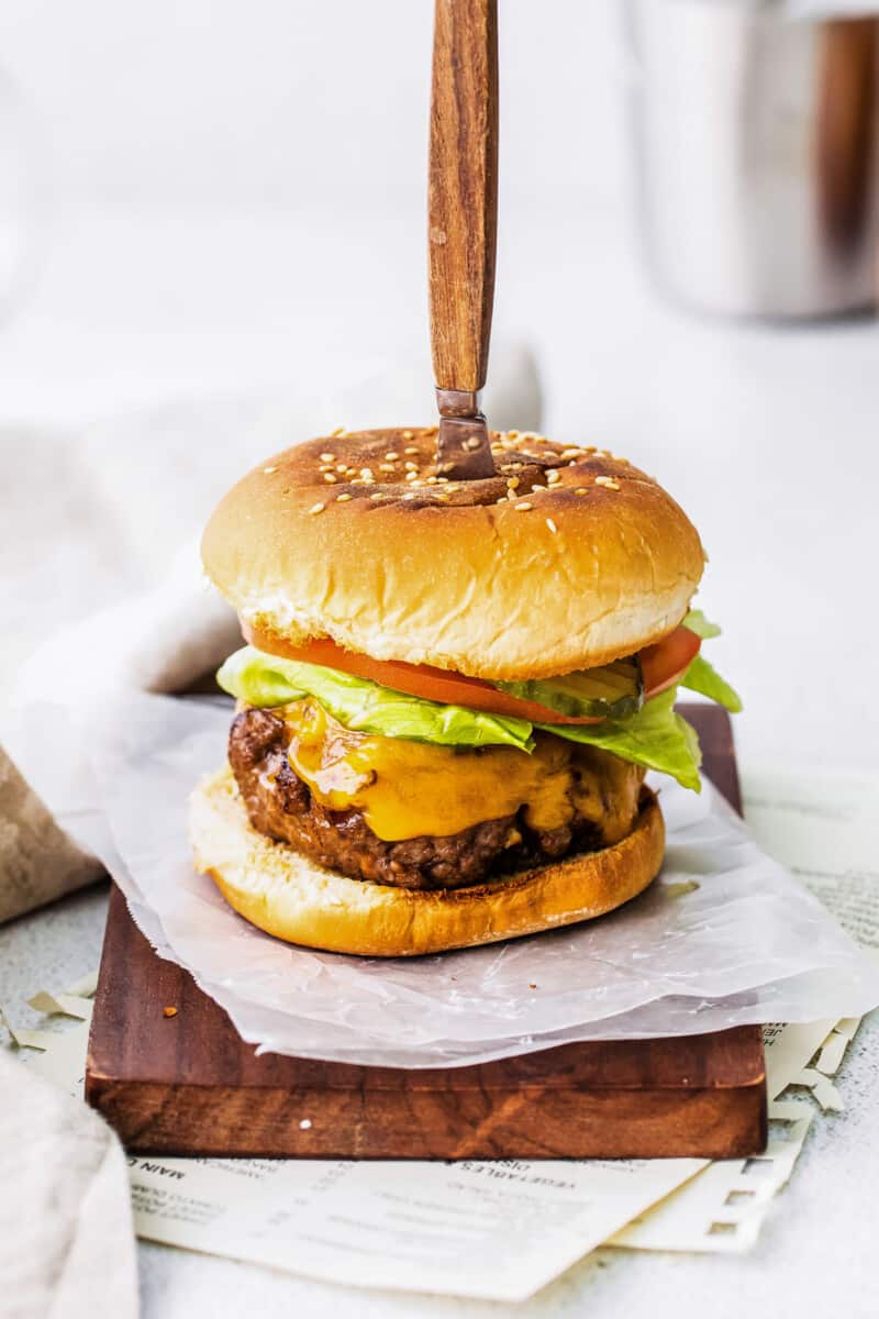 air fryer bbq burger with knife in top