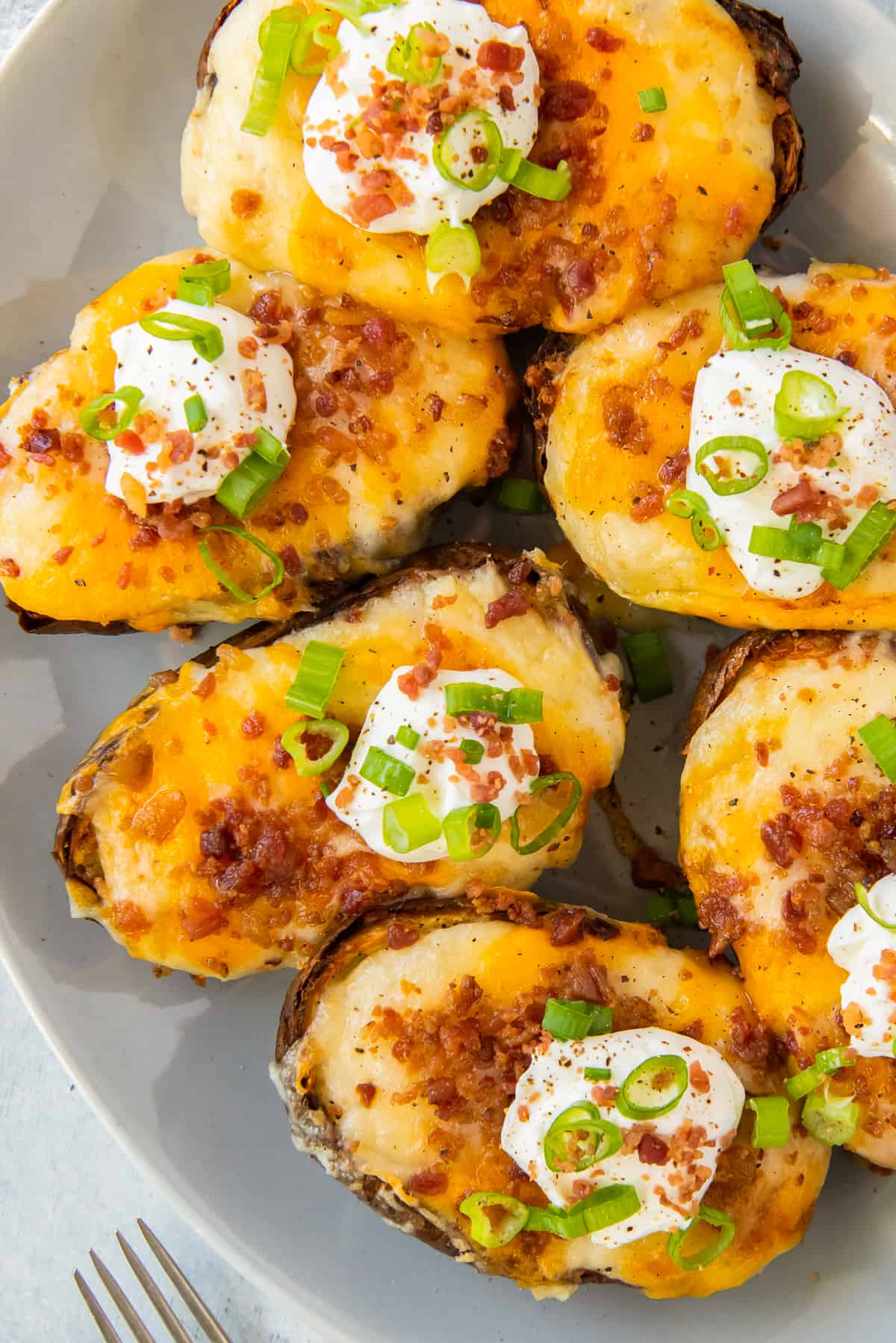 platter with air fryer twice baked potatoes with sour cream and chives