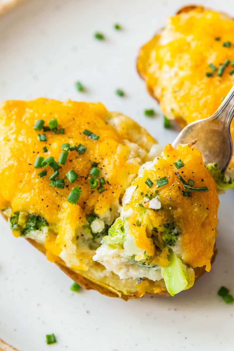 fork digging into broccoli cheese twice baked potatoes