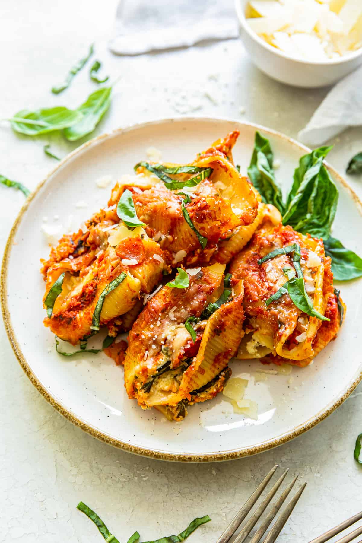 Crockpot stuffed shells on a white plate. - 9