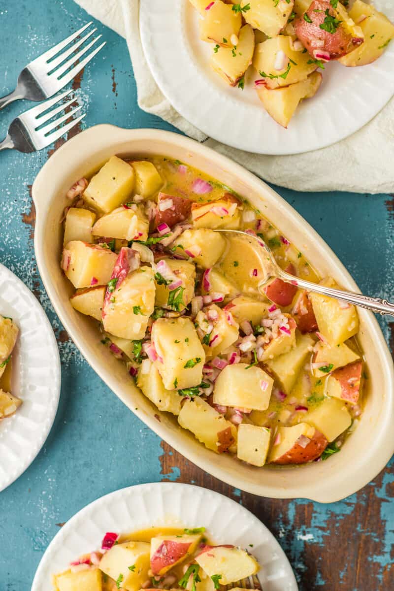 german potato salad with bacon in serving dish