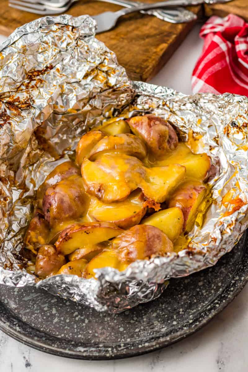 grilled ranch potatoes with cheese in foil packet