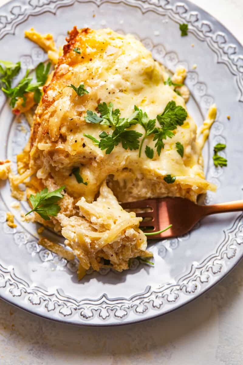 fork in cheesy potato casserole