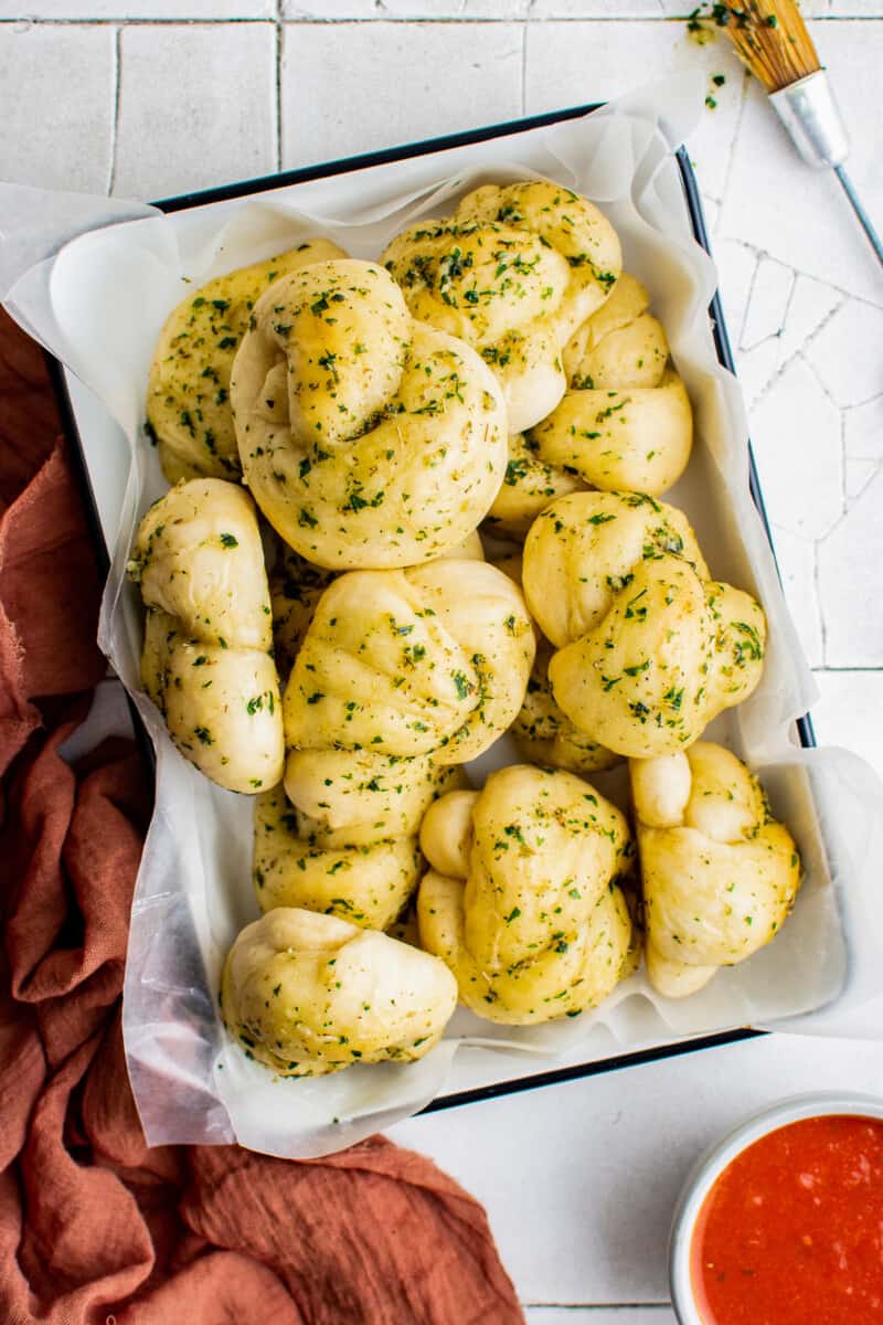 overhead homemade garlic knots in serving dish