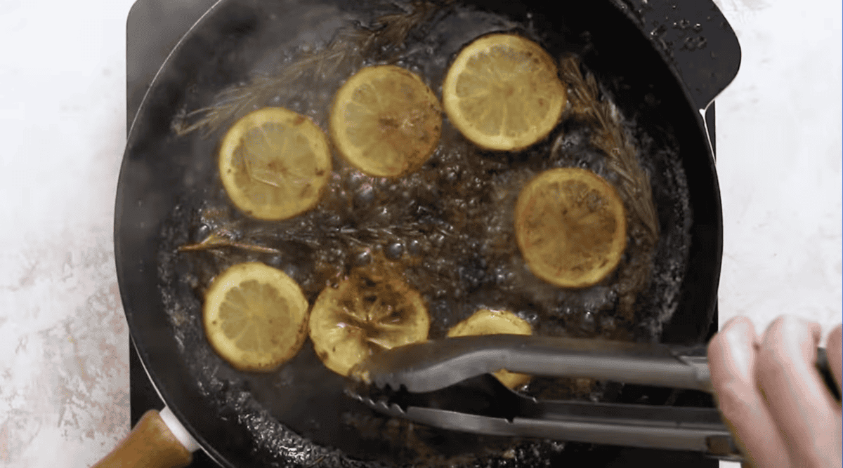 lemon slices in a cast iron skillet.