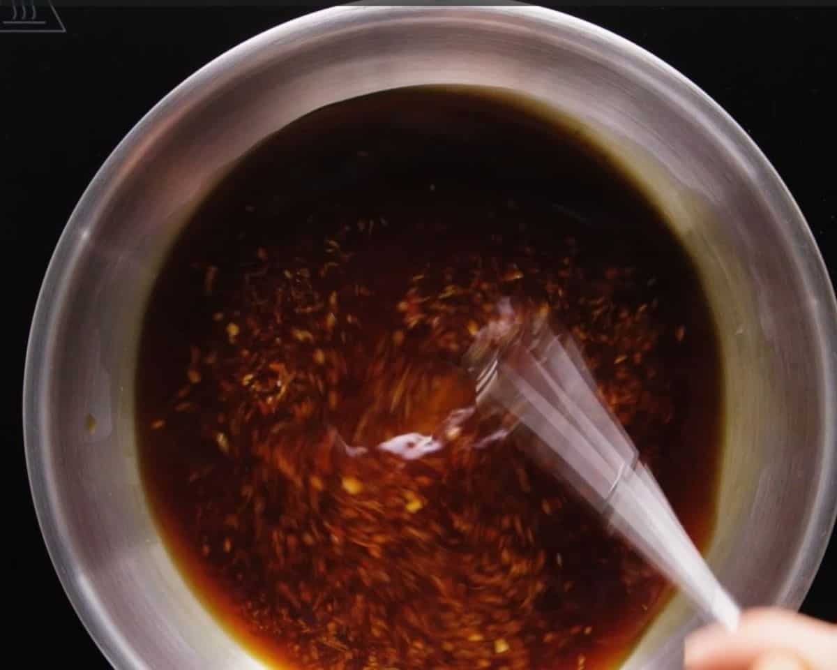 Whisking the glaze.