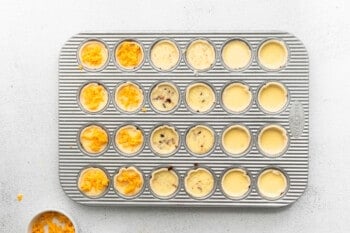 topped mini quiches in a mini muffin tin.