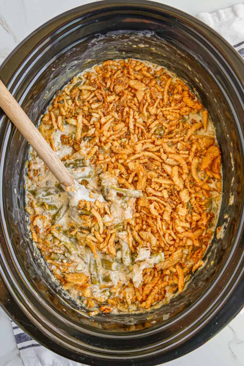 overhead image of crockpot green bean casserole