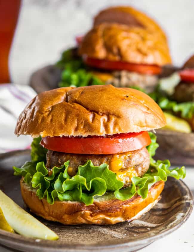 juicy lucy turkey burger with lettuce and tomato