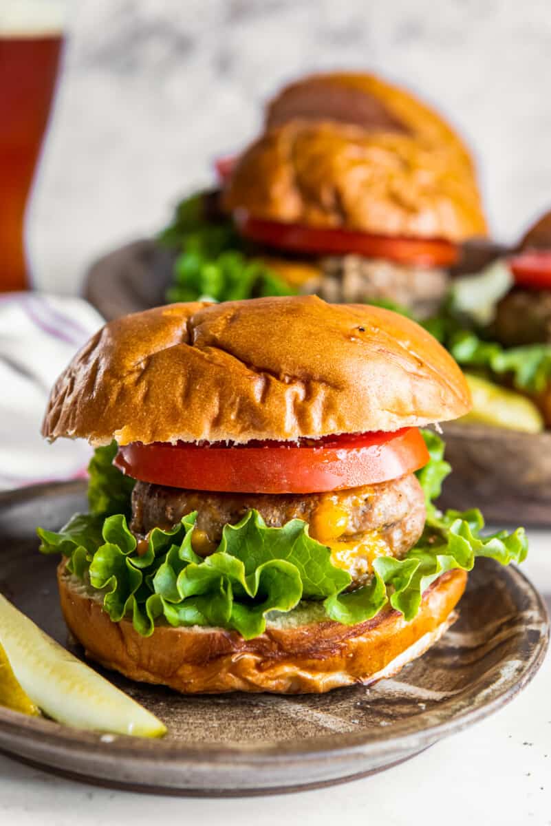 juicy lucy turkey burger with lettuce and tomato