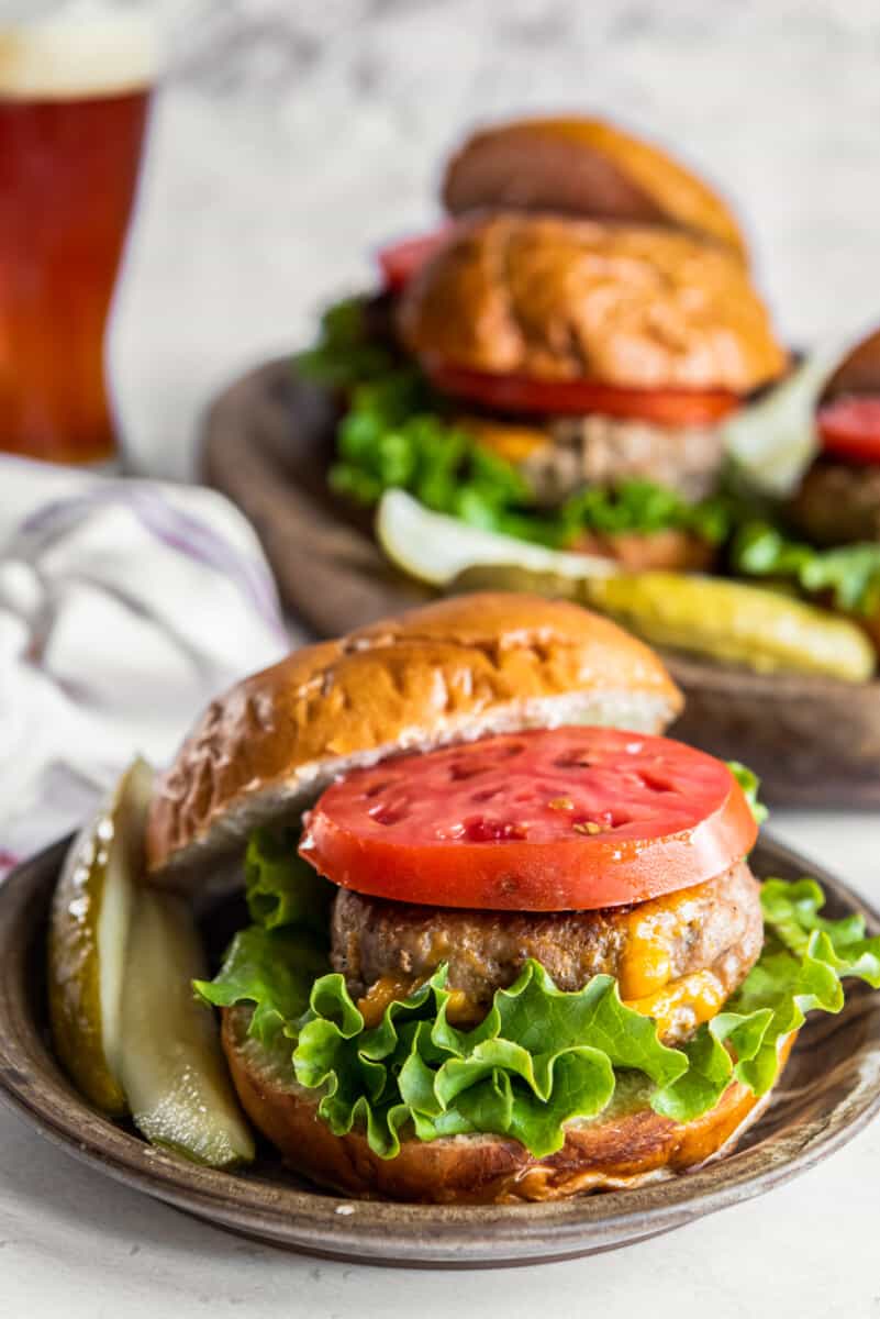 juicy lucy turkey burger with lettuce and tomato