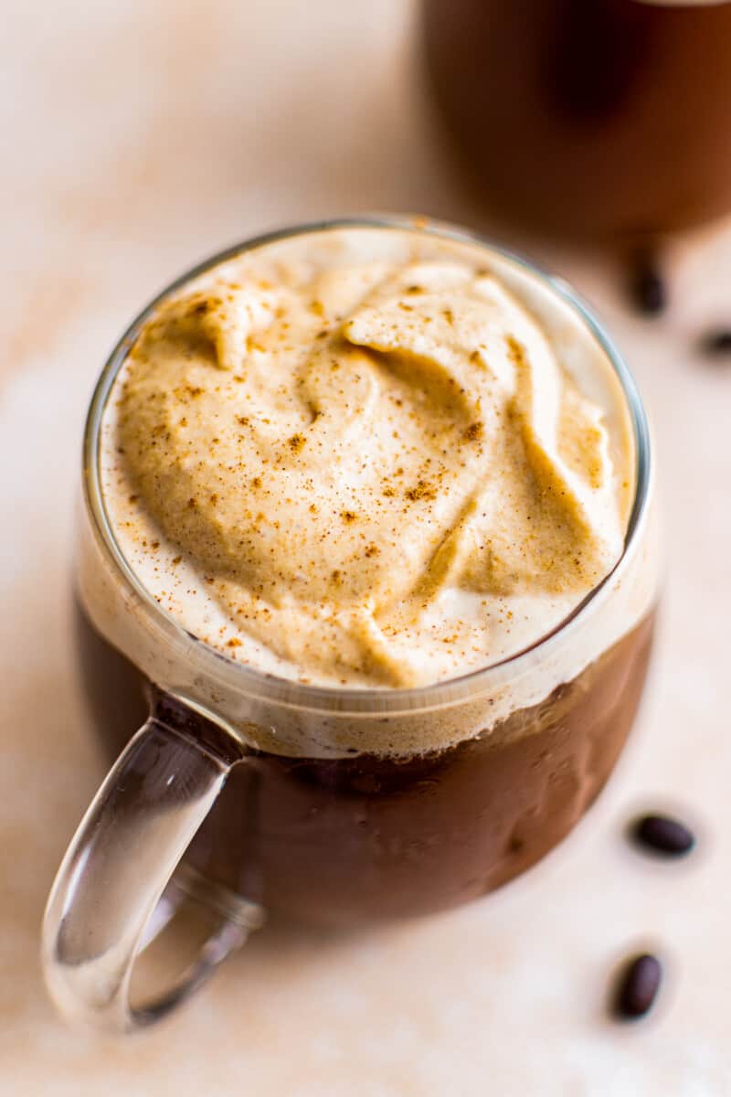 up close image of pumpkin cold foam on coffee