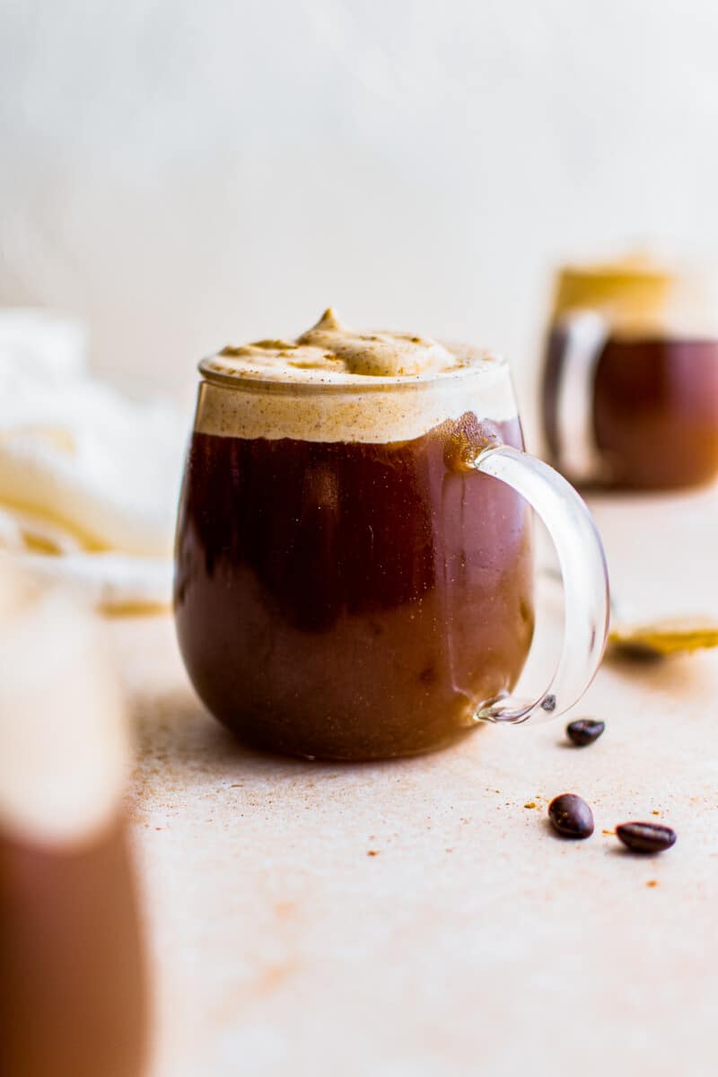 clear mugs with pumpkin cold foam coffee