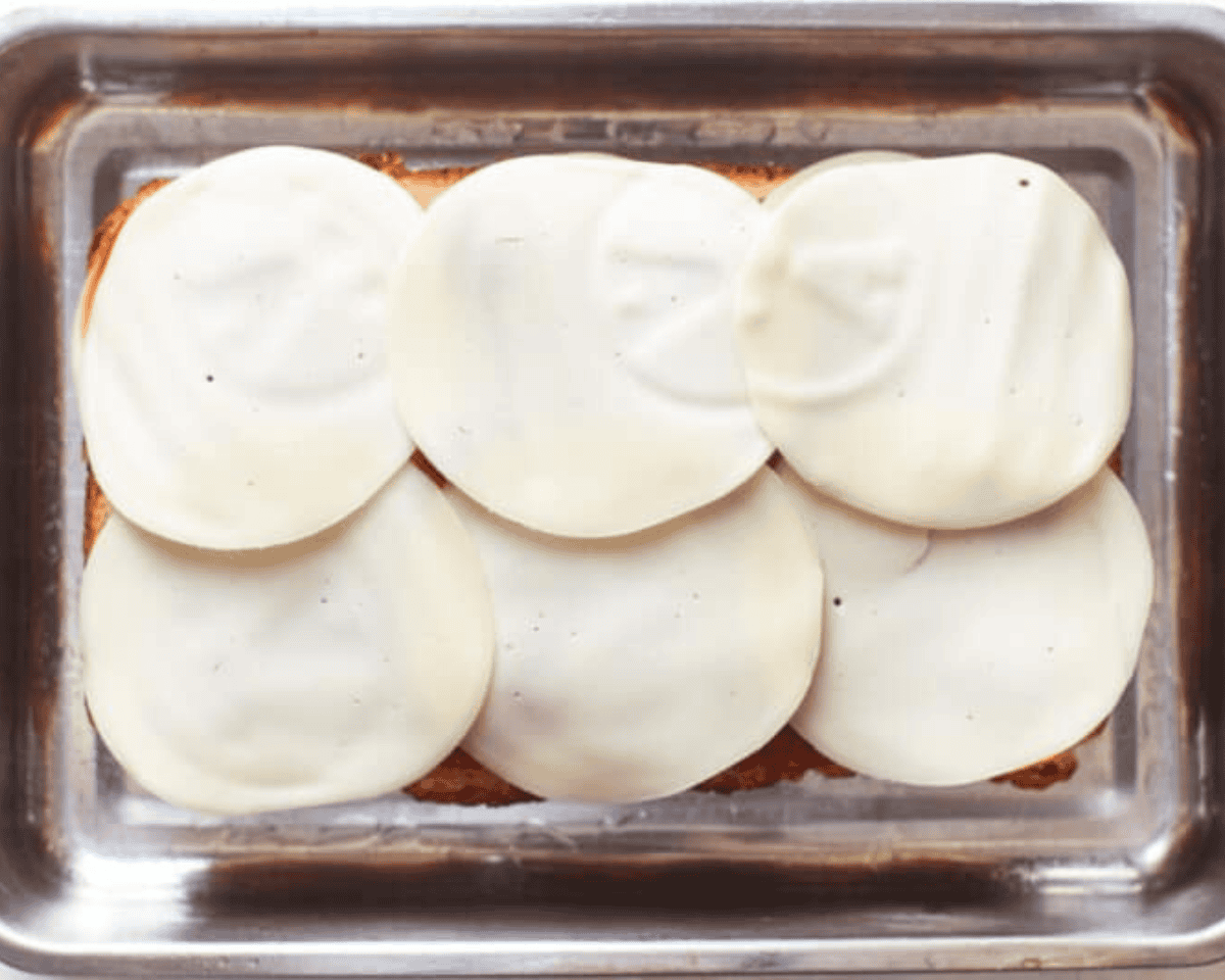 Another layer of cheese over the sauce.