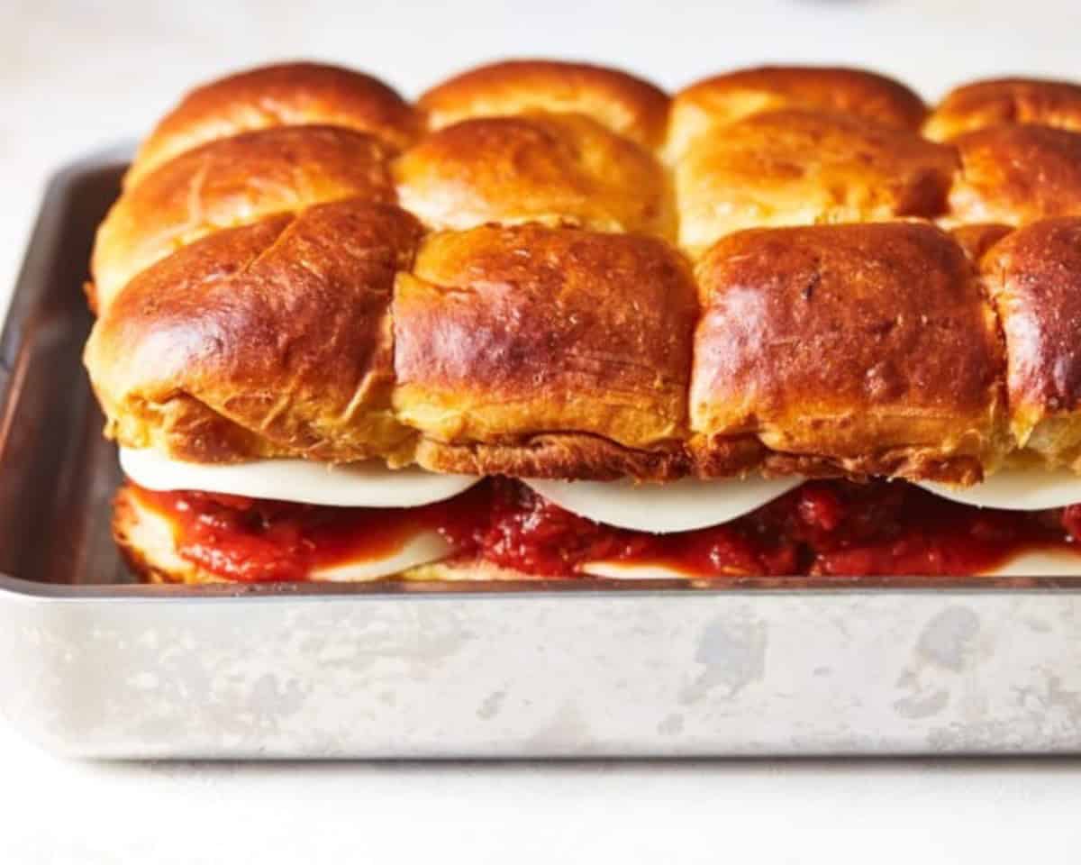The top layer of buns put over the sliders.