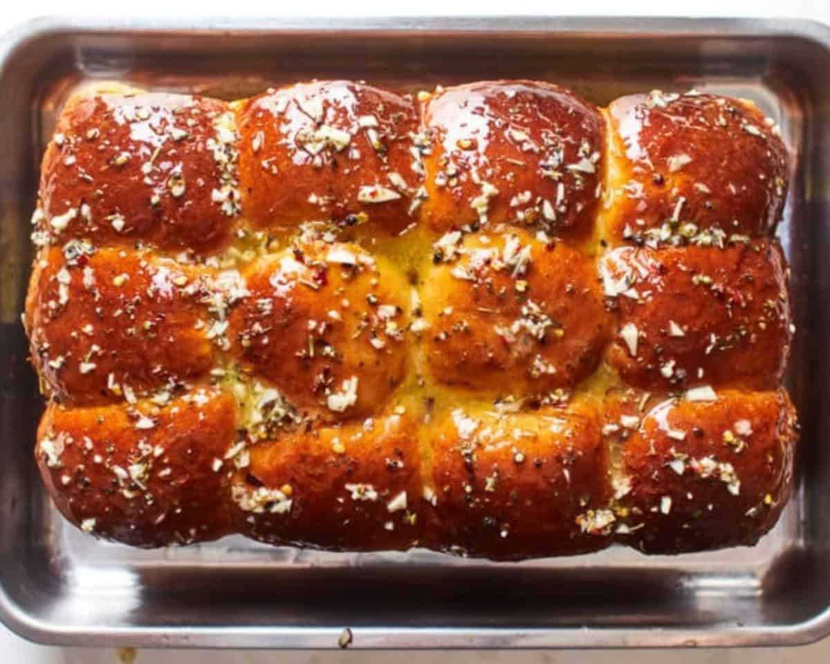 Parmesan cheese sprinkled over the tops of the buns.