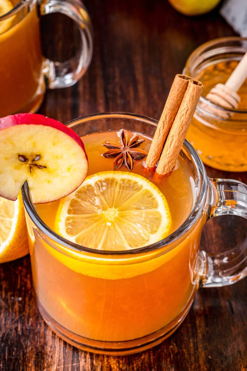 clear glass mug with world cider hot toddy