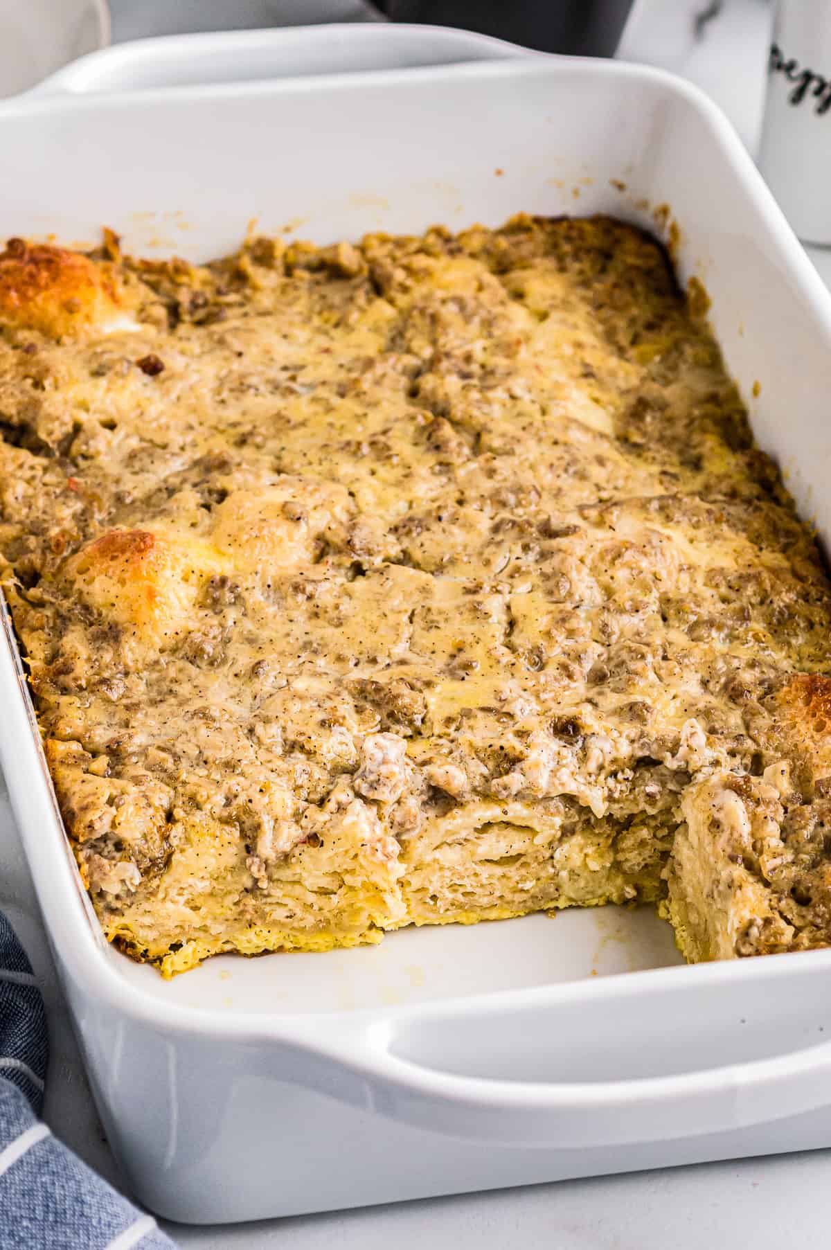 biscuits and gravy casserole in a white baking pan