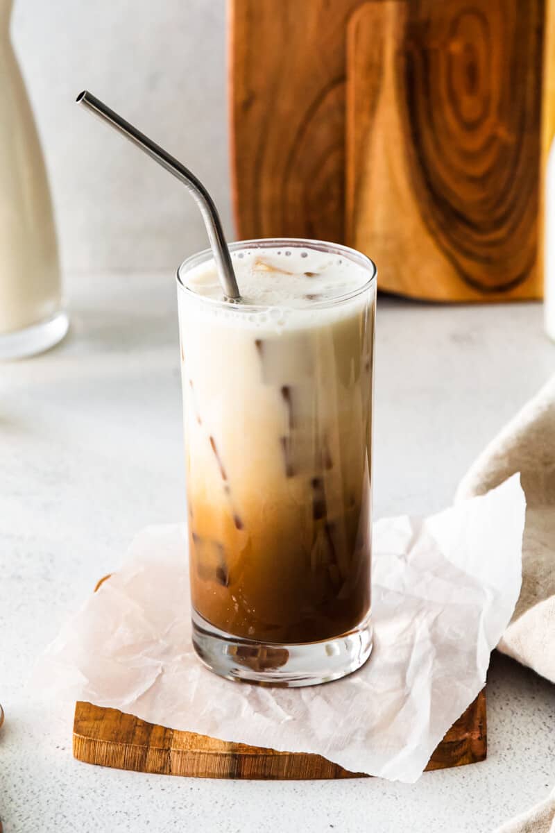 iced brown sugar shaken espresso in a clear glass with a straw