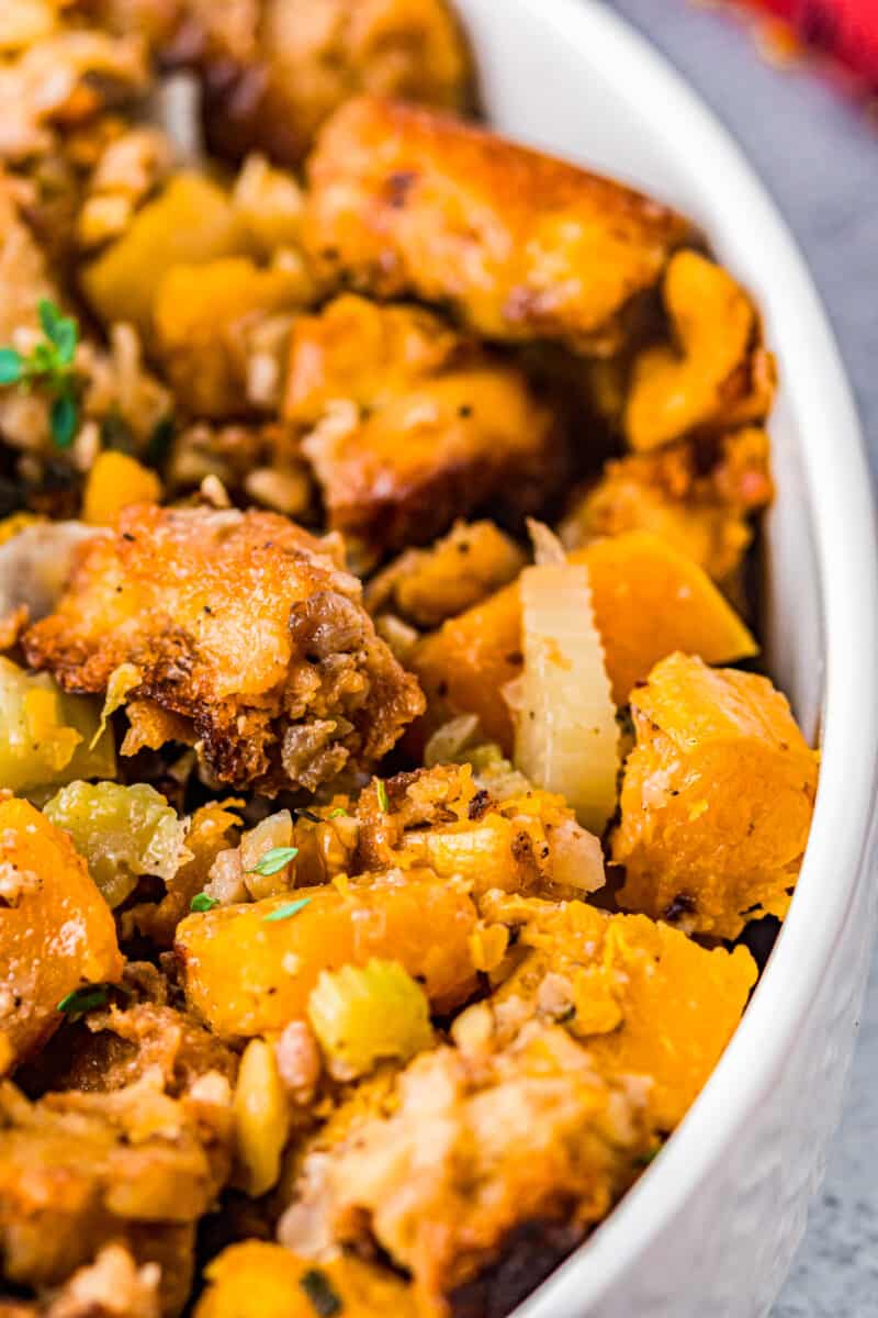 up close sausage butternut squash stuffing in baking dish