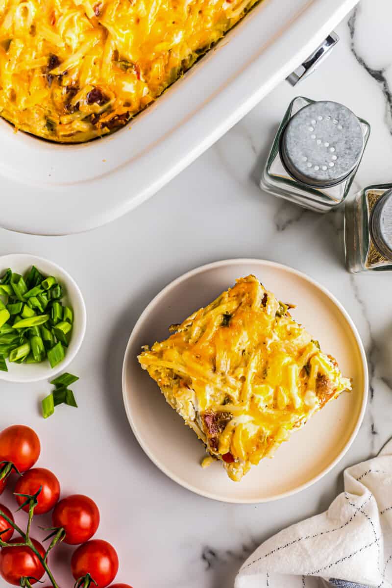 overhead image of slice of breakfast casserole on a white plate