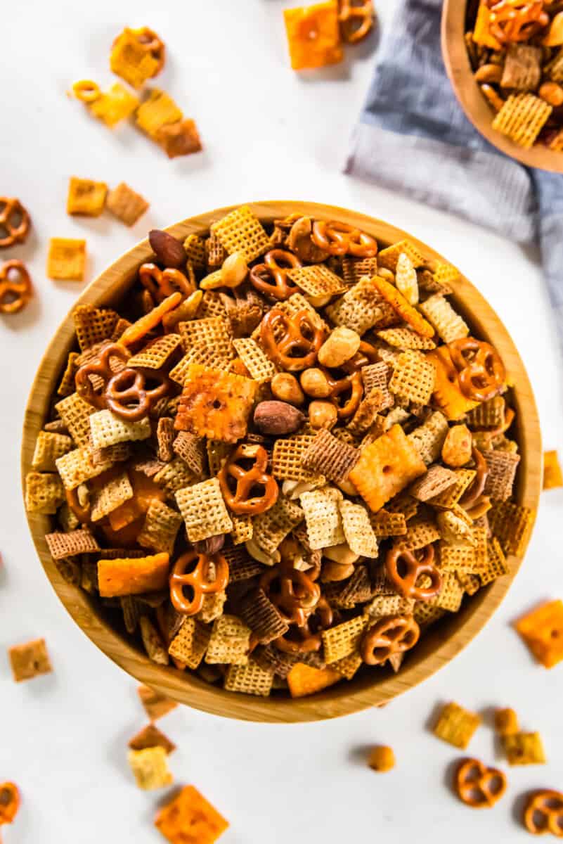 overhead image of chex mix in a wood bowl