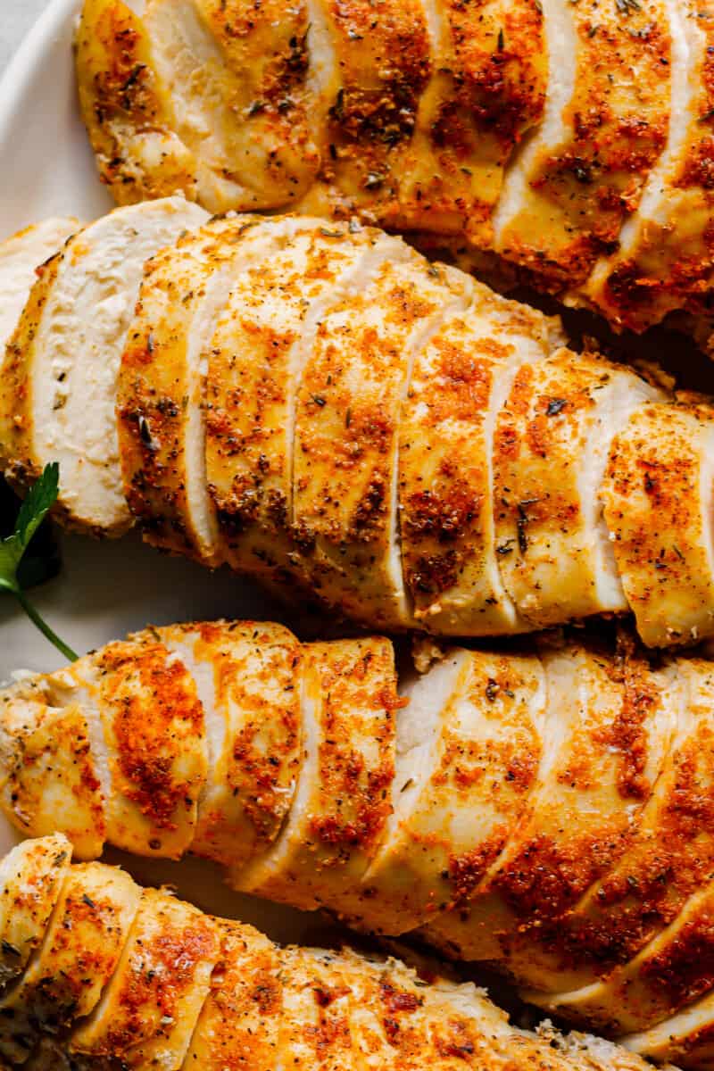 up close sliced crockpot chicken breasts with spice rub