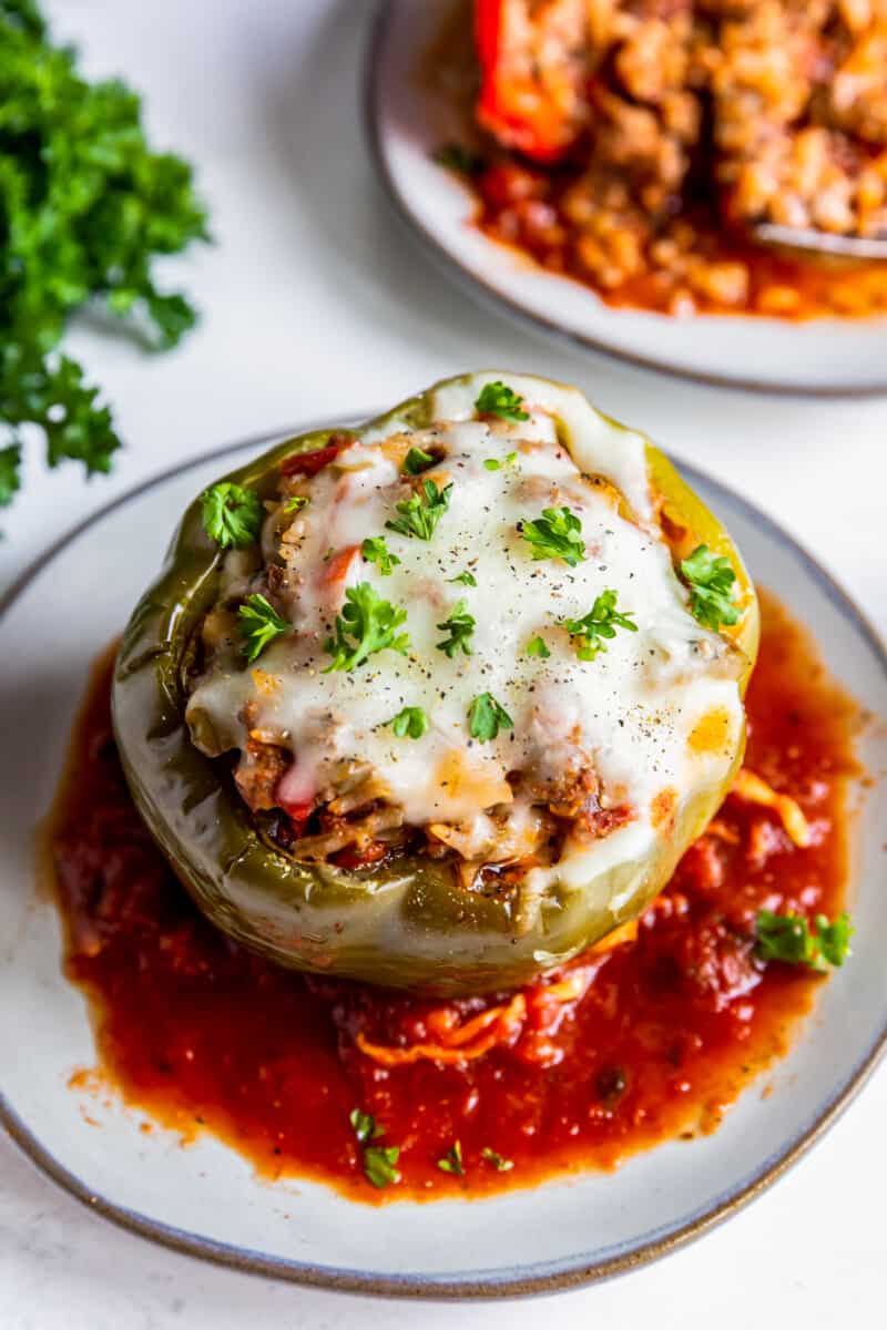 crockpot stuffed pepper with sauce on a plate