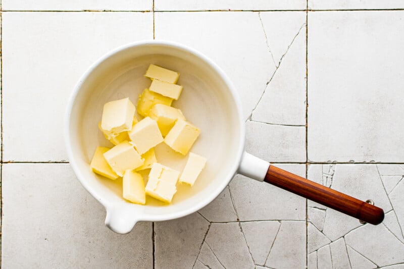 cubed butter in a white saucepan