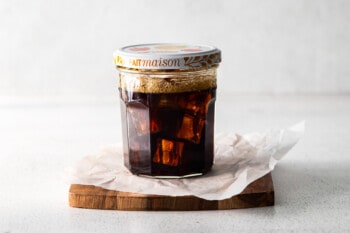 espresso and brown sugar syrup shaken in a clear glass jar with a lid