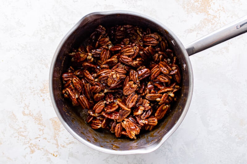 candied pecans in a saucepan