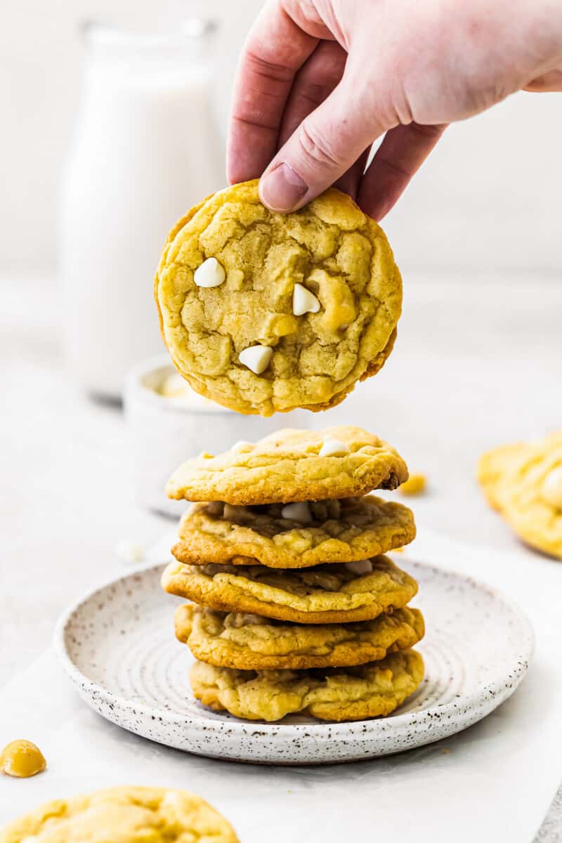 showing stacked white chocolate macadamia cookies