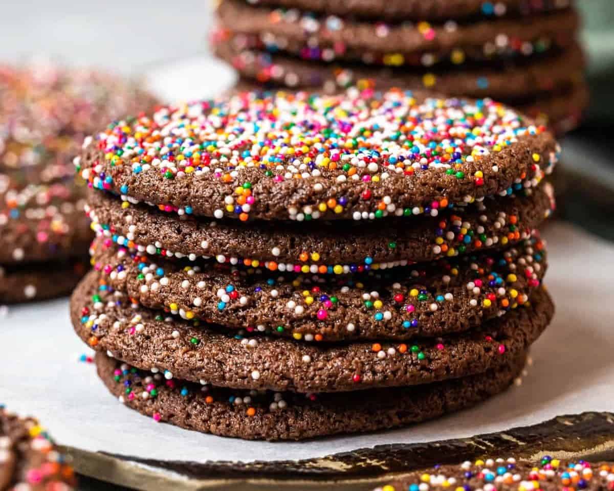 Baked chocolate butter cookies stacked.