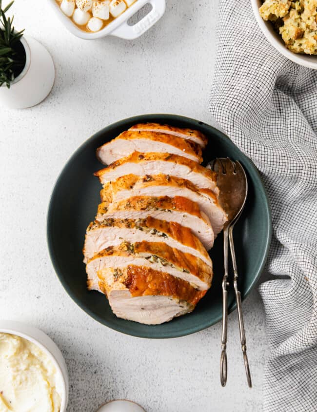 sliced turkey breast on a serving platter