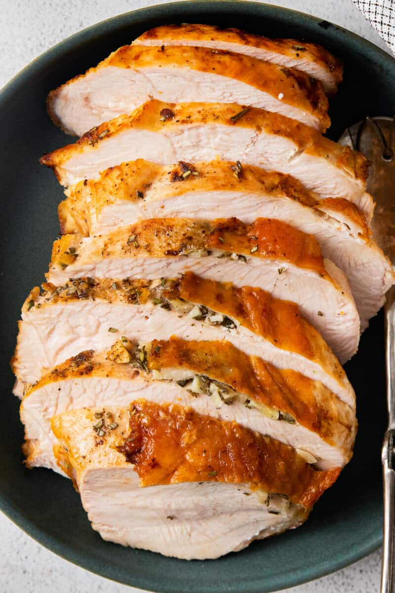 close up image of sliced turkey breast on a serving platter