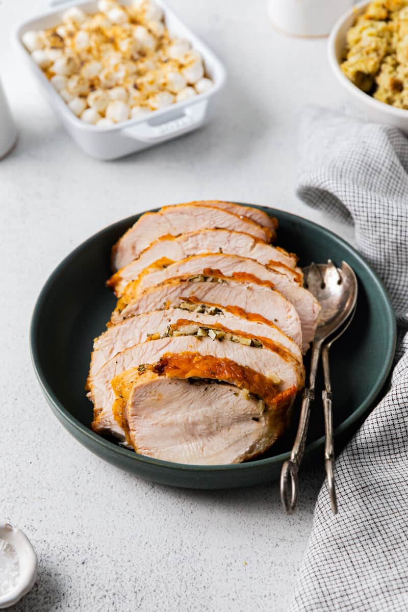 sliced turkey breast on a serving platter