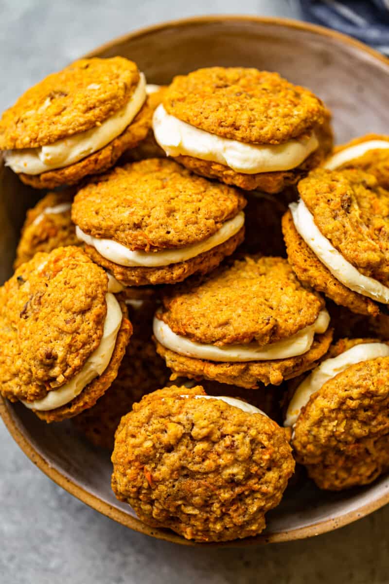 carrot cake sandwich cookies on a serving platter